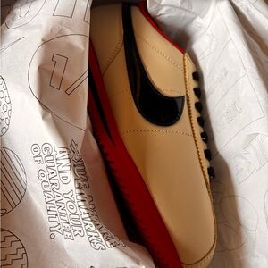 Nike women’s  Beige and Black Sneakers